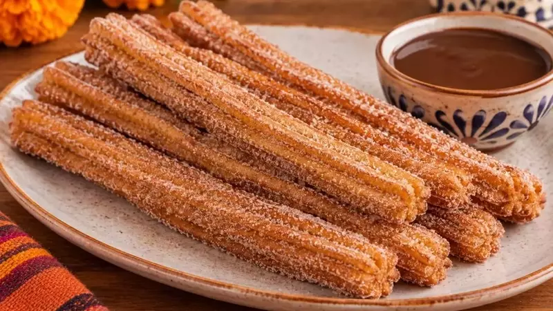 Churros con Sabor a Pan de Muerto: Una Innovadora Receta Otoñal